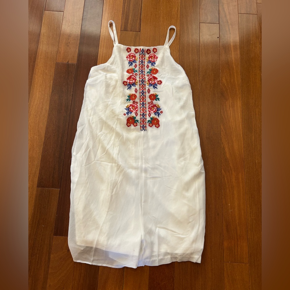 White Spaghetti-Strap Romper with Vibrant Floral Embroidery